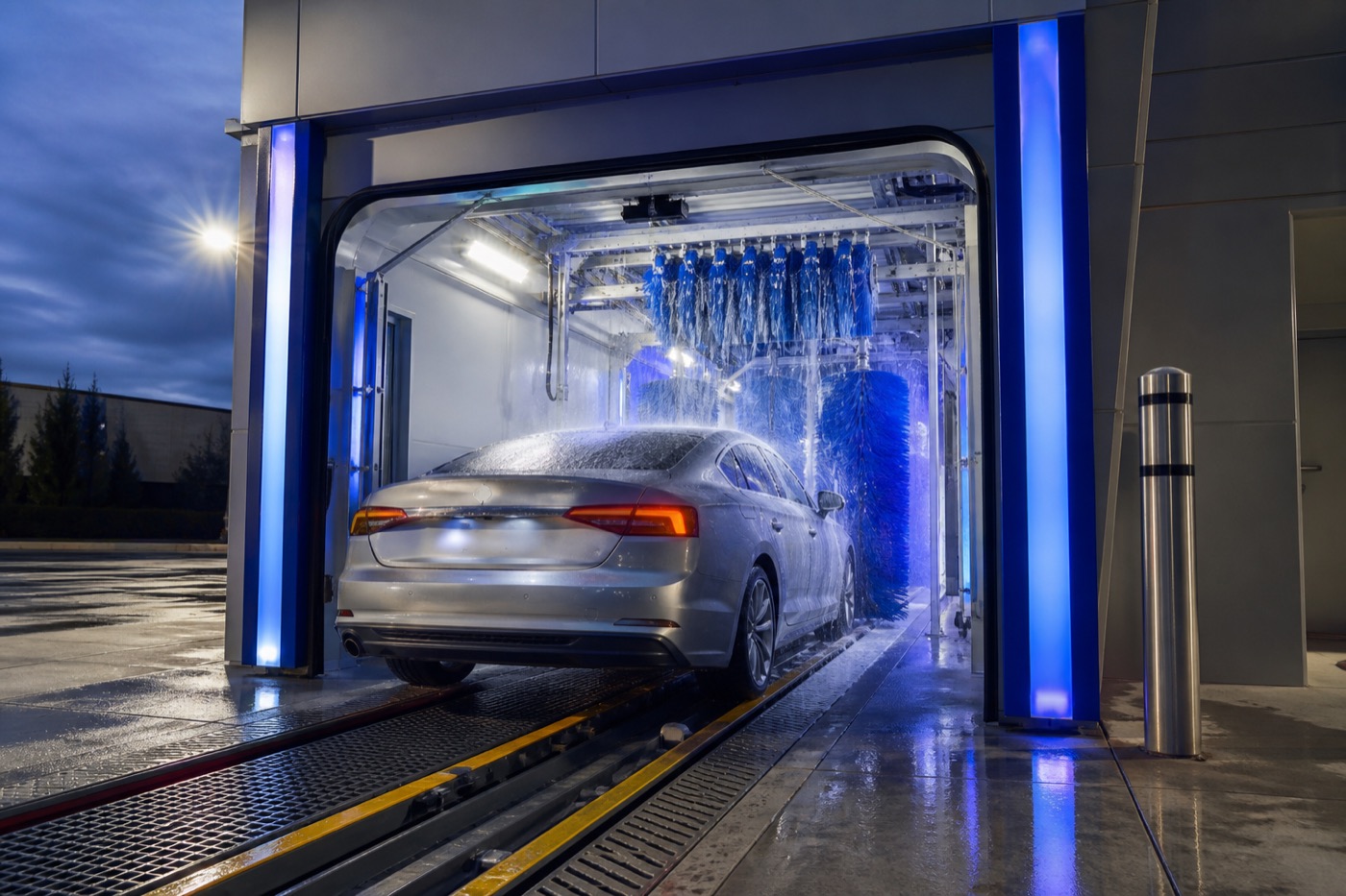 Clean automated car wash bay with a vehicle passing through
